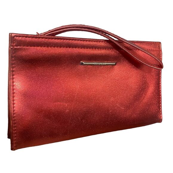 Clinique Handbags - Clinique Metallic Red wristlet with zipper closure and wrist strap